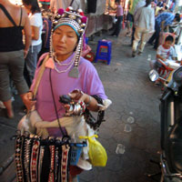 Hill tribe woman selling her wares at the market