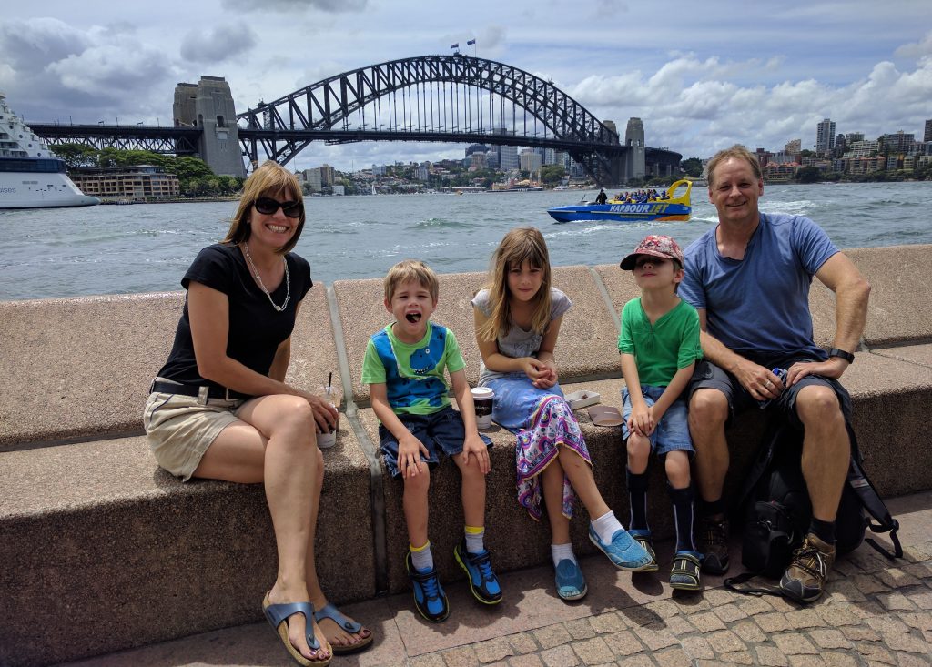 Family with Sydney harbour